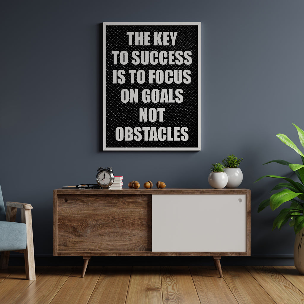 THE KEY TO SUCCESS IS TO FOCUS ON GOALS NOT OBSTACLES